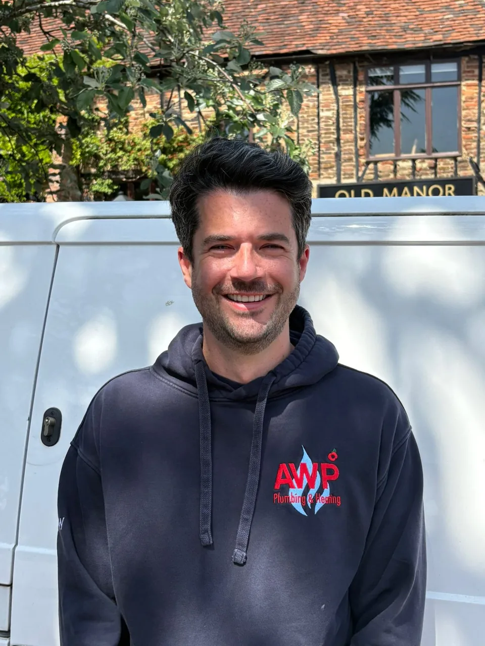 AWP engineer servicing a boiler in a North London home